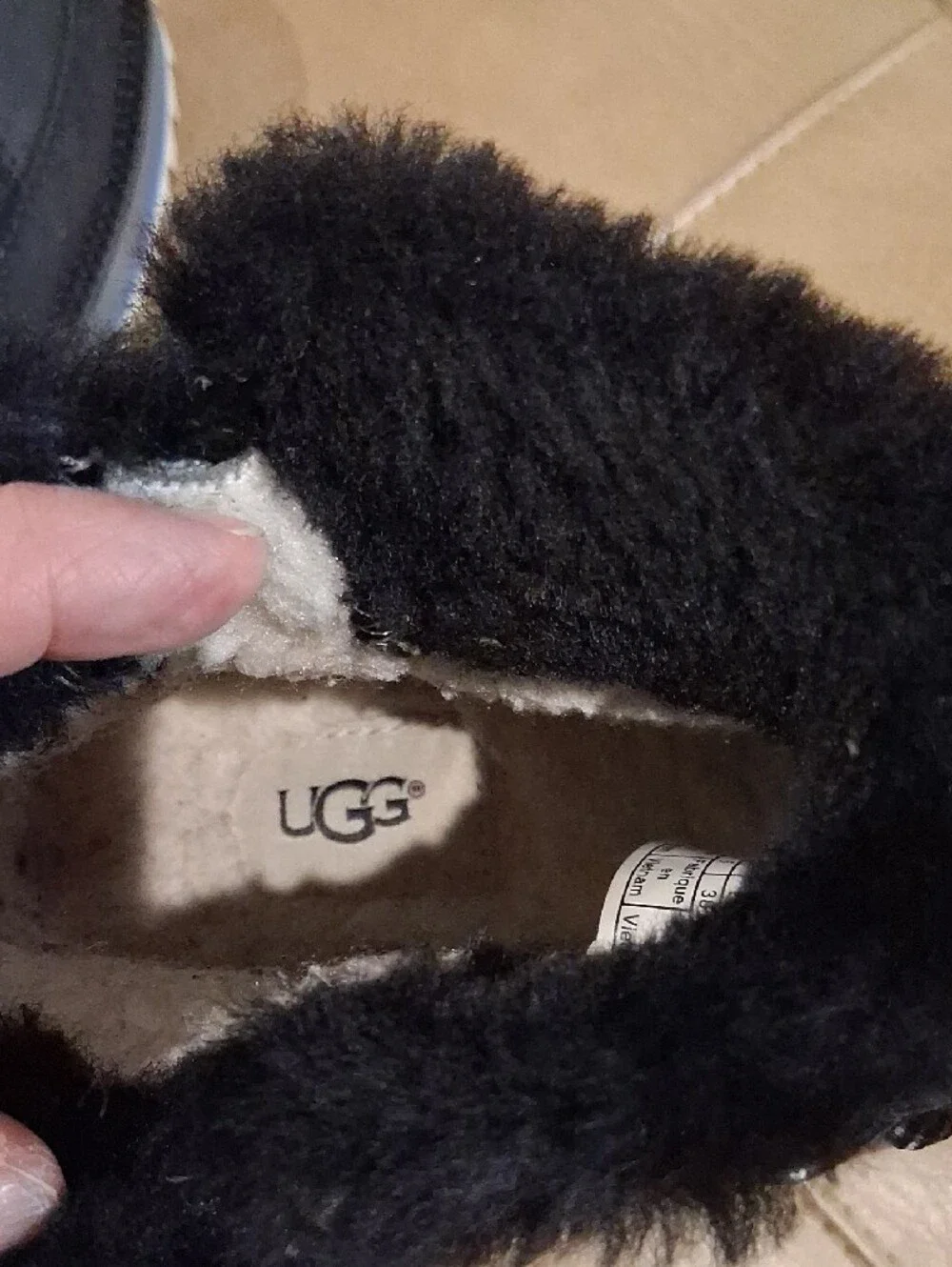 UGG Women’s Black Quilted Faux-Fur Platform Winter Boots